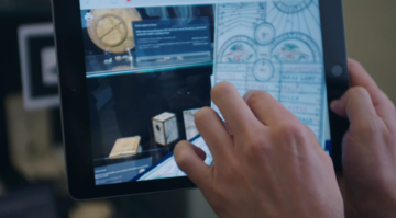 Photograph of someone using Cabinet on a tablet